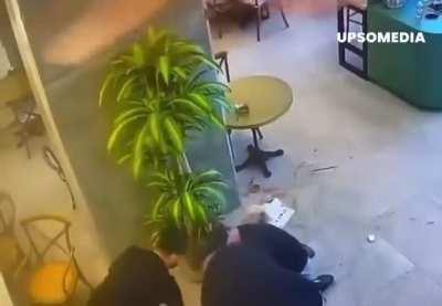 Pitbull attacks doodle in dog-friendly café. Pitbull owner flees the scene