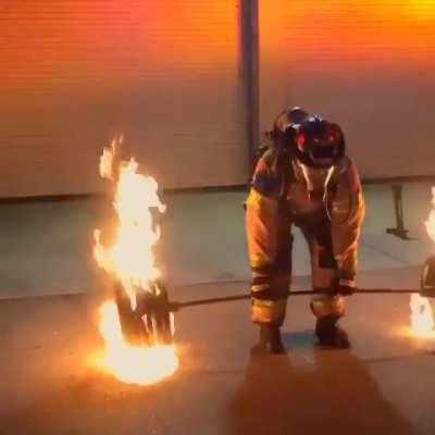 50 year old firefighter deadlifts 600 lbs of flaming steel to celebrate his retirement