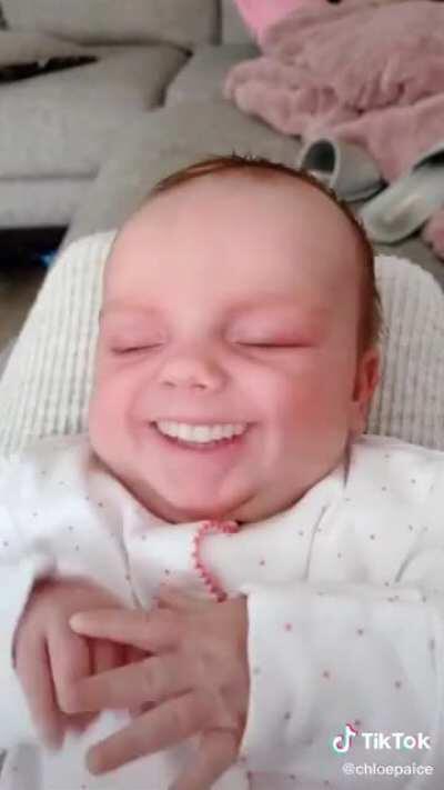 grinning filter on a baby