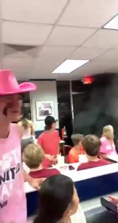 Rolling coal into a fast food joint filled with customers. Texas.