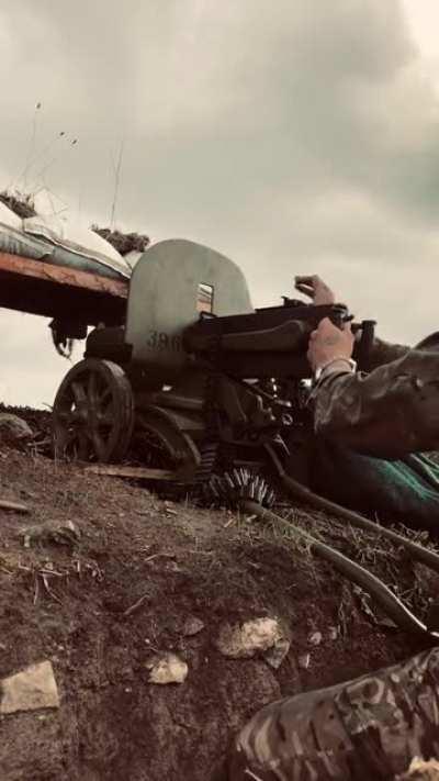 Ukrainian soldier uses a Maxim gun