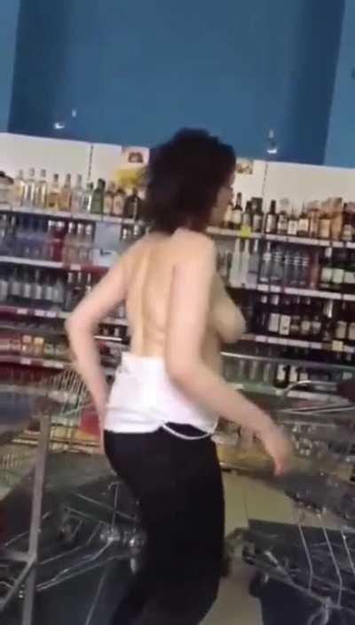 Woman dances for liquor store staff (NSFW)