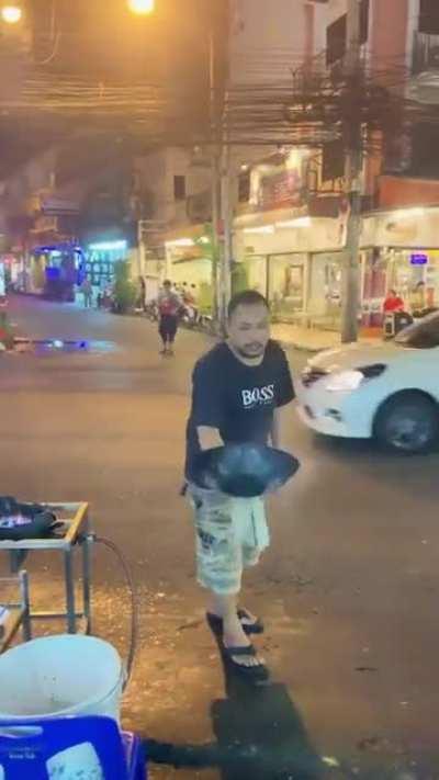 Chef throws cooked food and waiter receive it on next side of road without any wastage