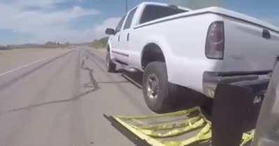 Police deploy grappler to stop this car.