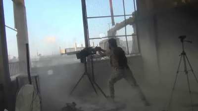 FSA fighters scooch a DShK MG into position to engage Syrian Army positions - al-Manshiya, Daraa - 11/18/2014