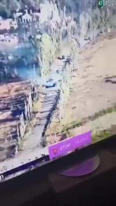 Ukrainian drone watching a Russian column going on attack south of Avdiivka using armored trucks such as improvised Urals and GAZ-AAs, artillery can be seen landing nearby