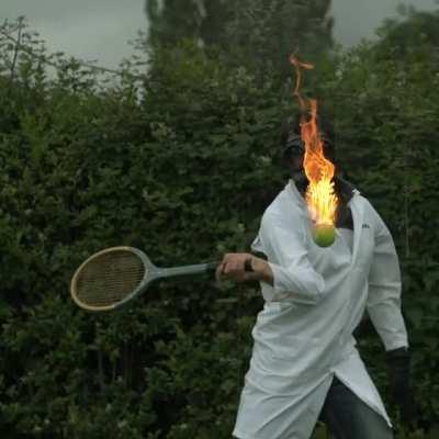 Whacking a tennis ball that's on fire