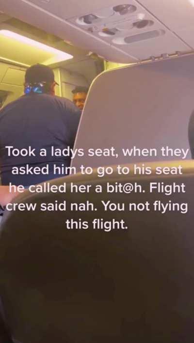 A man is kicked off an American Airlines flight after he took the seat of a woman.