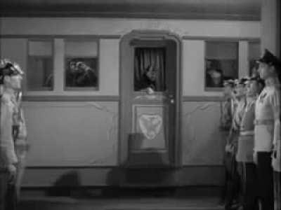 In the 1940 movie, 'The Great Dictator', Charlie Chaplin parodies Adolf Hitler. In this scene Chaplin [Hitler] greets 'Mussolini' getting off the train. This movie came out before the U.S. was at war with Germany. Hitler watched this movie not once but tw