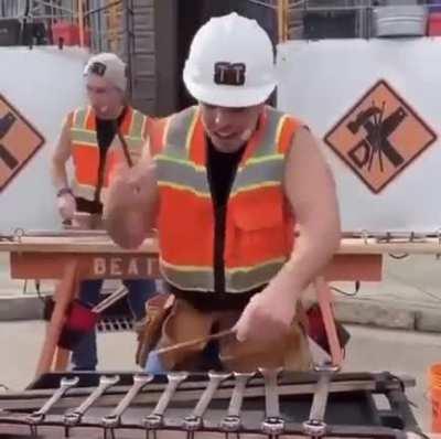 Worker playing the wrench