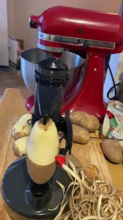 Automatic potato peeler