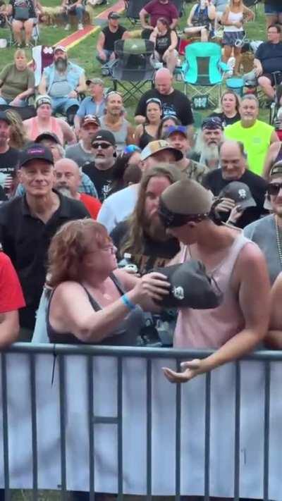 Young man making a lady’s day with a simple gesture  