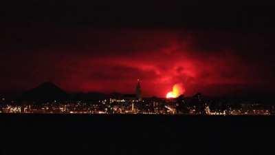 🔥 Reykjavik skyline illuminated by a volcano