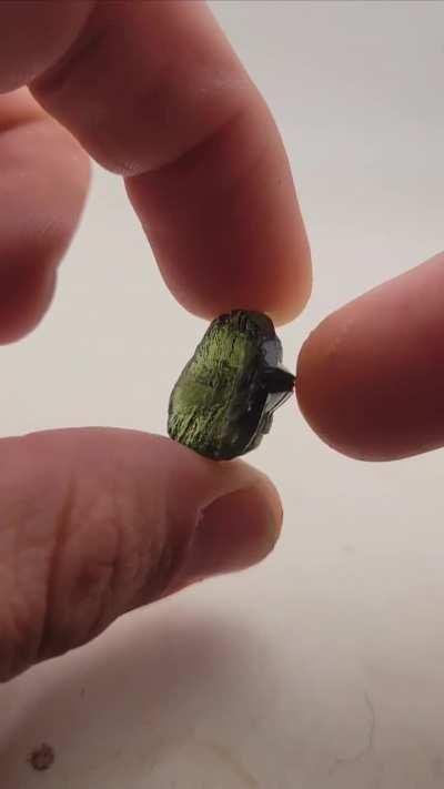 UFO carved in Moldavite.