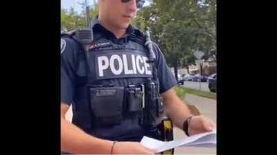 Cyclist gets ticketed hard for not stopping at a stop light and loses his cool