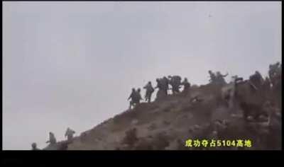 A clash between the Indian and Chinese armies at hill 5104 north of Pangong Tso. It is impossible to use weapons there, so cobblestones and sticks are used.