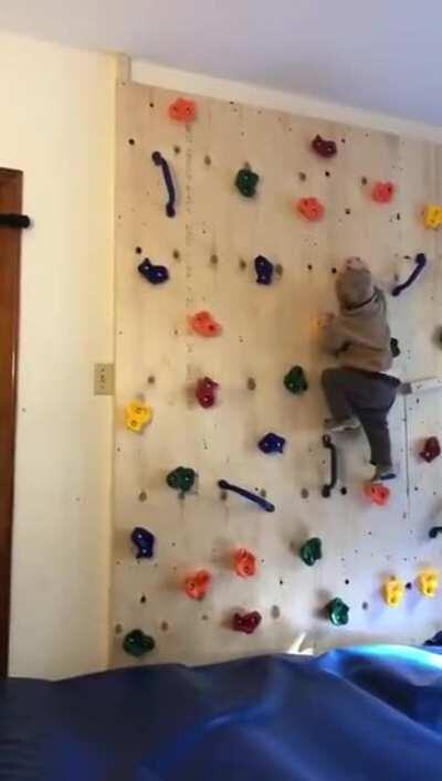 Father built his kid a climbing wall to get him to stop climbing furniture and it only made the tot more powerful