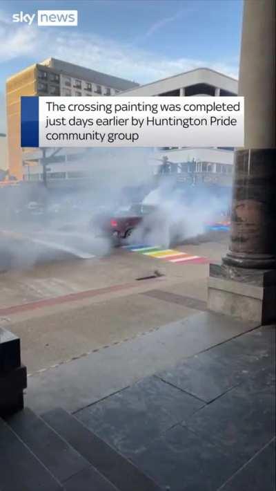 Truck driver does burnout on Pride crossing