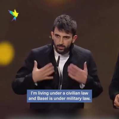 Palestinian & Israeli filmmakers, Basel Adra & Yuval Abraham, win for Best Documentary at Berlinale, for their film 'No Other Land' - about Israeli settler violence. They call for an end to the Occupation and apartheid & urge Germany to 