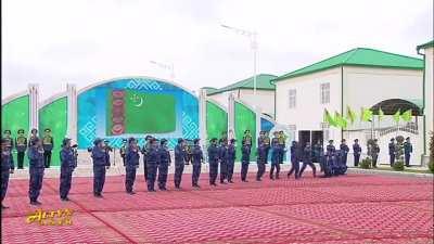 Turkmenistan’s new president, looking somewhat unimpressed, watches a dance routine performed by police cadets