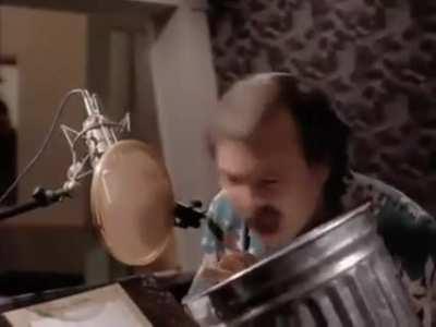 Voice actor Frank Welker using a trash can to do the roars of the lions in The Lion King (1994)