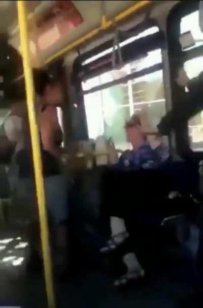 Elderly woman gets slapped after spitting on someone.