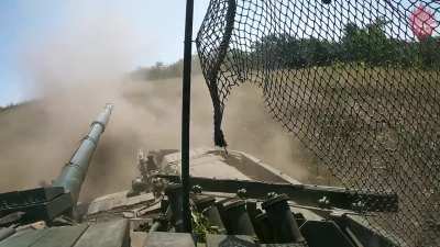 Ukrainian T-72 firing at Russian positions on the Pokrovsk front with its 125mm cannon. Tank Company of the 14th Assault Brigade Chervona Kalyna of the Ukrainian National Guard. September 2024