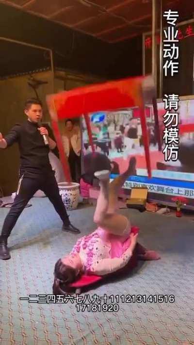 Woman rotating a pot and table perfectly with her feet