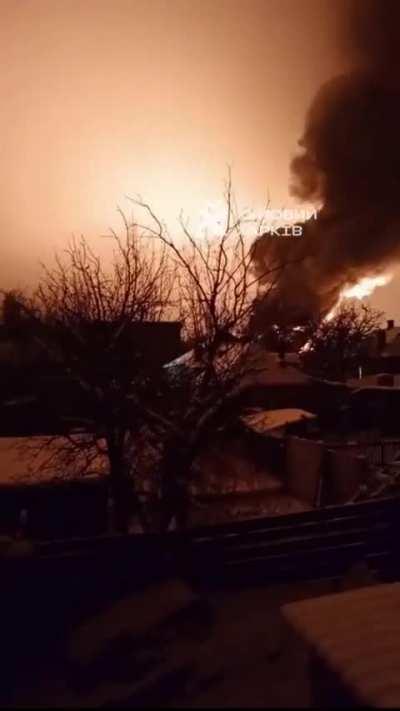 Footage of a Geran-2/Shahed-136 drone hitting a petrol station in Kharkiv (Nemyshlianskyi district) that's already on fire from a previous hit, 09.02.2024