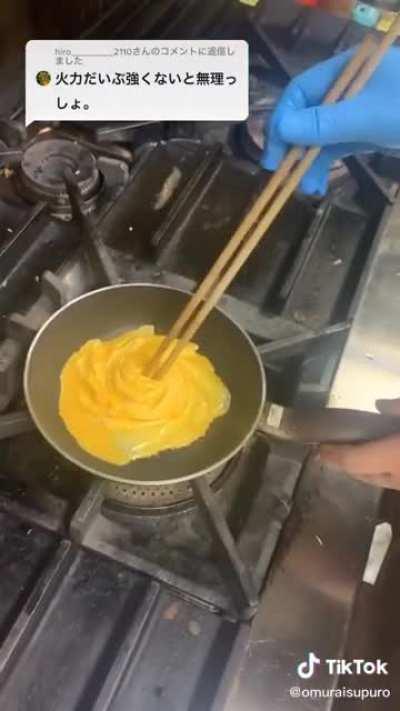 An interesting way of cooking an omelette!