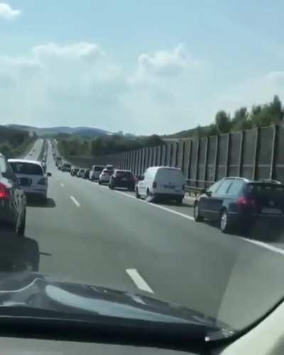 A law in Germany requires all drives on highways to line up to the far side of their lanes during heavy traffic so that emergency vehicles can pass them more easily to reach the scenes of accidents