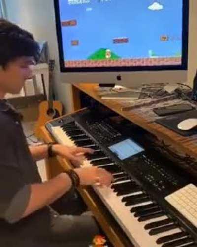 The Way this Guy Plays the Sound Effects for Mario on His Piano