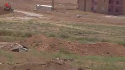 Syrian Army tank rolls into firing position before slinging a round at the camera - Raqqa - 6/2/2013