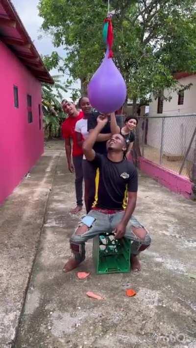 A tense game of water balloon.