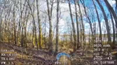 Russian fiber-optic FPV drone hits a Ukrainian soldier armed with an anti-drone gun