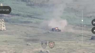 Ukrainian artillery makes a direct hit on a Russian tank. The tank crew then evacuates on foot (July 2024)