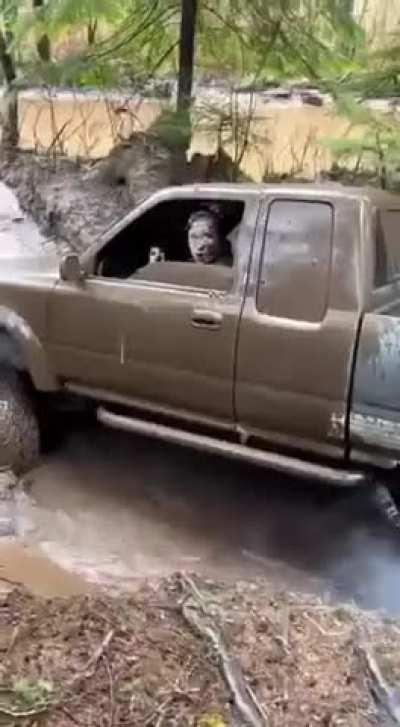 Man drove into the mud without closing his car windows first