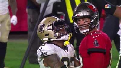 C.J. Gardner-Johnson smiling at Tom Brady