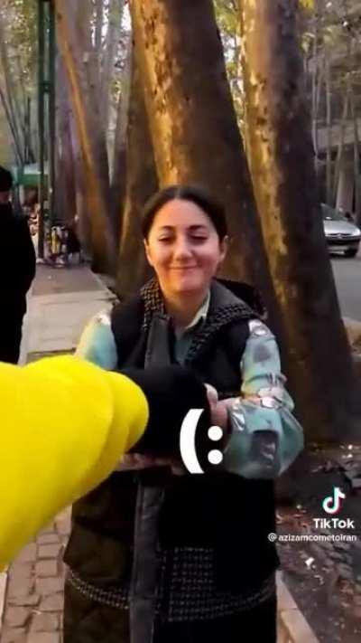 Boy in Iran goes around the city and gives out candy to brave unveiled girls to show support for Iranian women's social movement