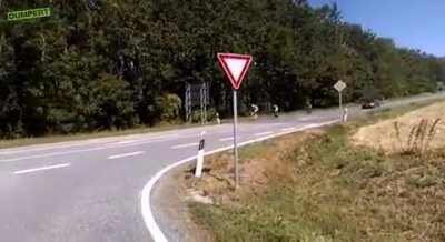 WCGW not signalizing a turn on a bike.