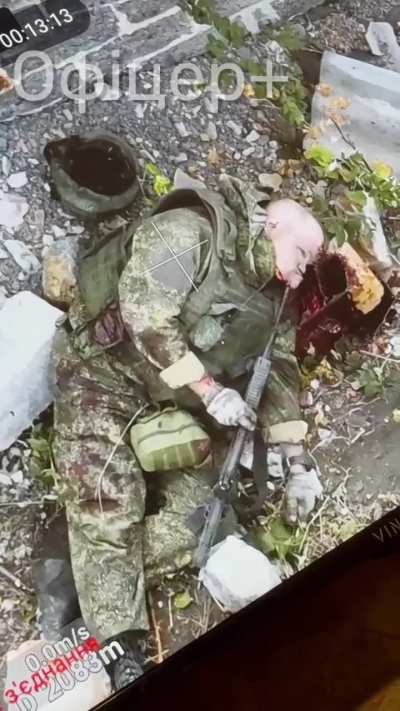 A russian invader filmed shortly after he shot himself. [Graphic]