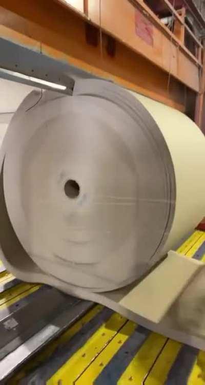 Cutting this large roll of paper