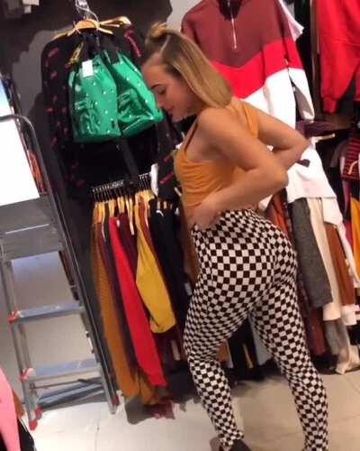 Posing in checkered pants