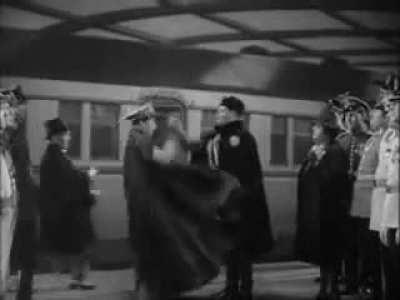 In the 1940 comedy movie, 'The Great Dictator', Charlie Chaplin parodies Adolf Hitler. In this scene Chaplin [Hitler] greets 'Mussolini' getting off the train. This movie came out before the U.S. was at war with Germany. Hitler watched this movie not once