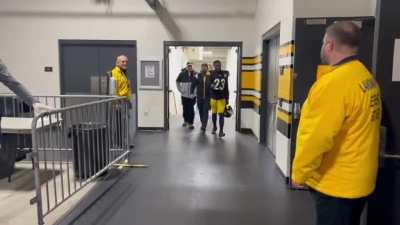 Kazee entering the locker room after the game