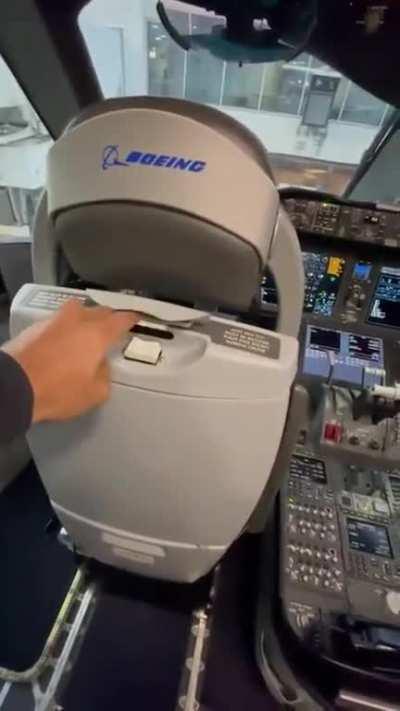 The 787 flight deck! Ever wondered how pilots get in their chairs? This is how.   Not all aircraft have electric seats but use manual adjustments.