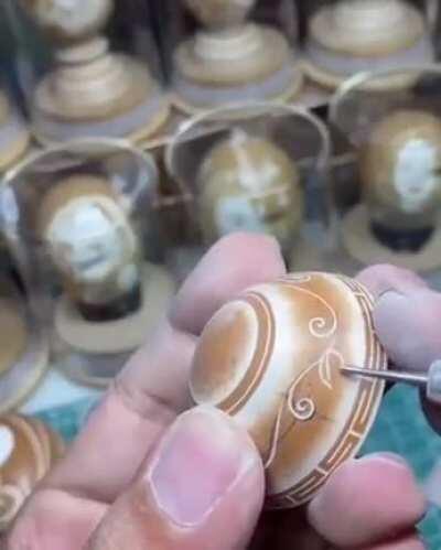 The fragile art of egg shell carving