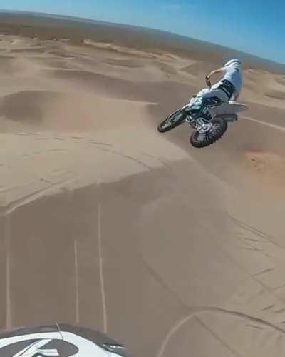 Great dirt bike jumps require an equally great rider with a GoPro. he Nailed it :)