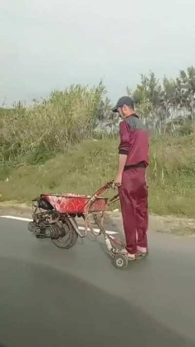 Where there's a wheel, there's a way. His wardrobe is also on point.