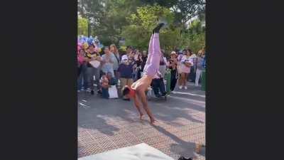 The finger and body strength of this street performer is beyond amazing